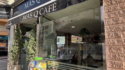 Interior of Mas Que Café in 74