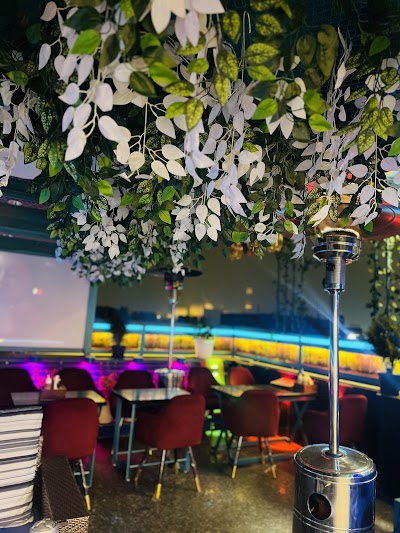 AAA FOODS & ROOFTOP CAFE atmosphere