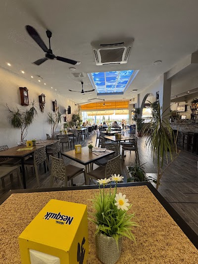 Interior of Heladería Cafetería Olé. in Calp
