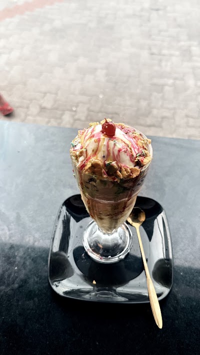CafeMoonlightSip coffee