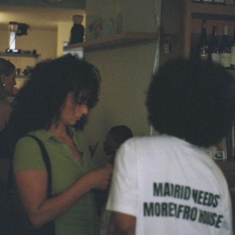 The back of a t-shirt reading Madrid needs more Afro house
